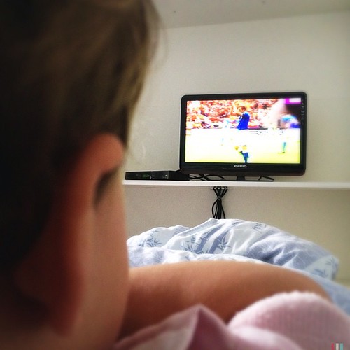 Fan watching Copa América live on a smart TV using Copa América IPTV streaming