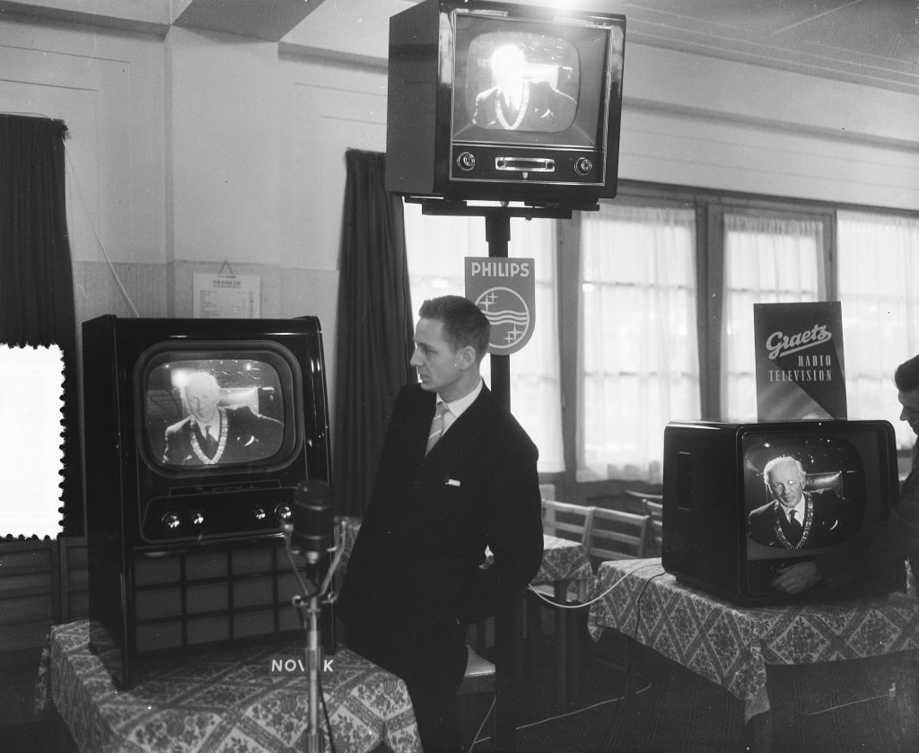 Person comparing IPTV reseller panel dashboards and credit pricing on a laptop