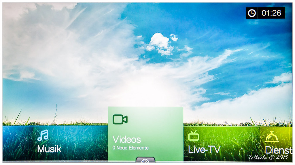 Android TV box and remote used to sideload IPTV apps on Firestick